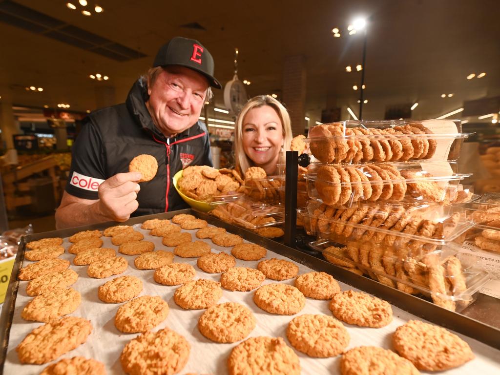 Sheedy with Bravery Trust’s Jo Crawford and some of the Anzac biscuits rolling out this week. Picture: Rob Leeson