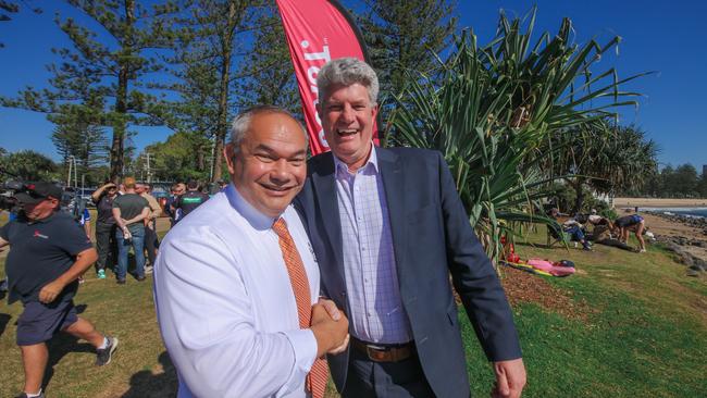 Mayor Tom Tate and State Tourism Minister The Hon. Stirling Hinchliffe on the Gold Coast on Friday – they might be shaking hands here but are at odds over the Gold Coast hosting the 2026 Commonwealth Games. Picture; Glenn Campbell