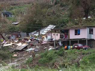 One house survives, the other taken, in the town of Rakiraki, after Cyclone Winston hit Fiji. . Picture: Brett Phibbs