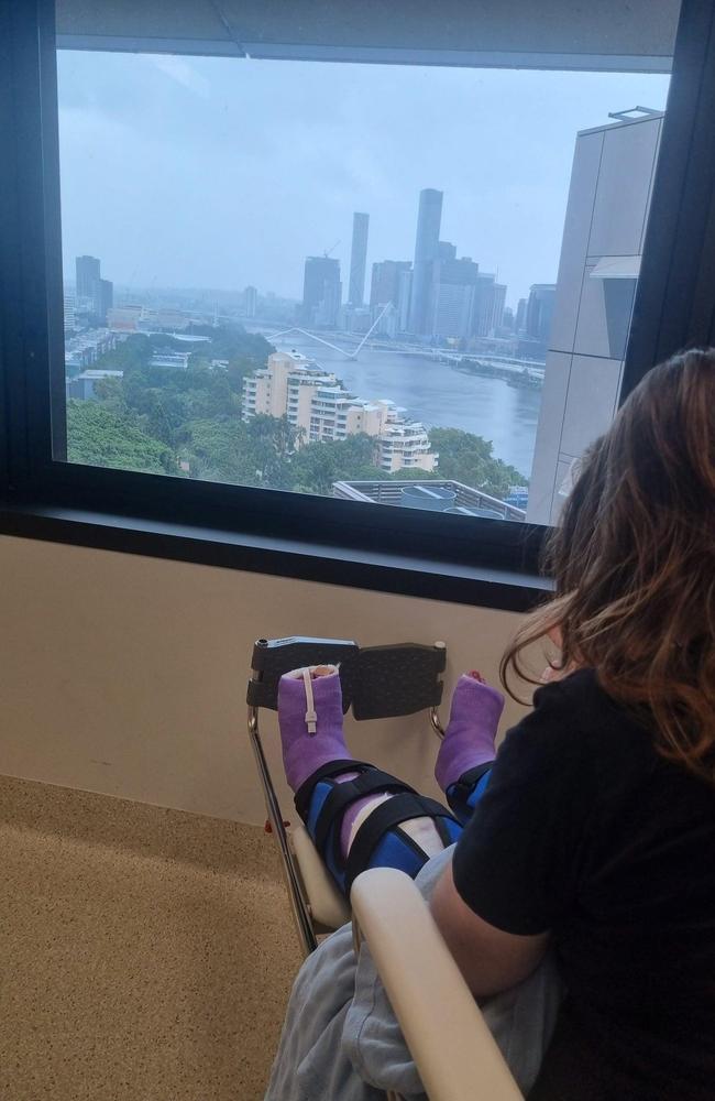 Alex Hanney, 18, pictured in hospital where she has spent the past 22 days recovering from complications following major leg surgery.