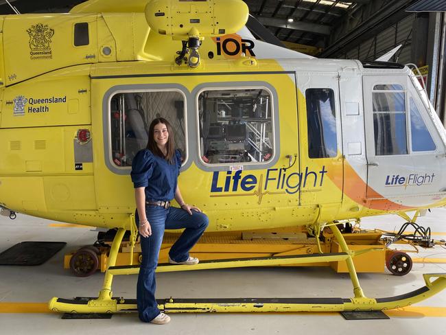 Jorja McIntyre with the RACQ LifeFlight crew who flew her to Toowoomba after she was trampled by a cow at Cinnabar in December 2023. Pictures: RACQ LifeFlight