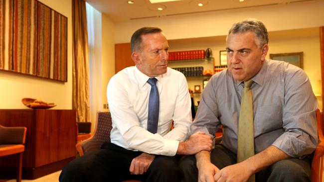 PM Tony Abbott congratulated Treasurer Joe Hockey after the rate cut in an awkward encounter.