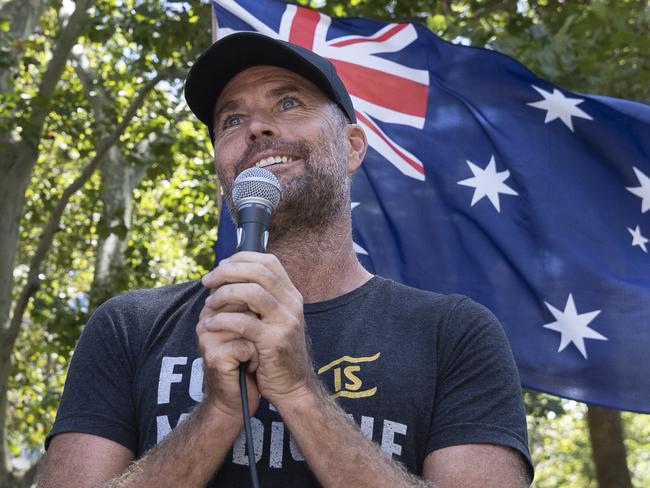 SYDNEY, AUSTRALIA - FEBRUARY 20: Pete Evans is seen at an anti-vaccination rally at Hyde Park on February 20, 2021 in Sydney, Australia. Evans is a controversial celebrity chef and conspiracy theorist who was recently banned fromÃÂ InstagramÃÂ and Facebook for sharing misinformation about the coronavirus and vaccines. The protestors are demonstrating against mandatory COVID-19 vaccines. The COVID-19 vaccine is due to be rolled out to frontline health workers across Australia from next week. The Australian government has purchased enough vaccines for all Australians to be vaccinated, should they choose to do so. While vaccinations are not mandatory, some industries might require workers to get the COVID-19 vaccine as a condition of employment. (Photo by Brook Mitchell/Getty Images)