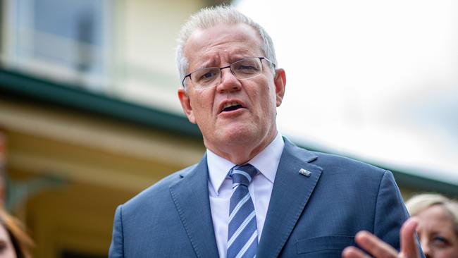 Scott Morrison said increasing the price caps meant “even more Australians can get into a home sooner”. Picture: Christian Gilles