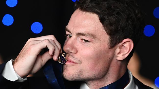 Lachie Neale poses with the Brownlow Medal at the Gabba during the 2020 AFL Brownlow Medal. Picture: Quinn Rooney/Getty Images