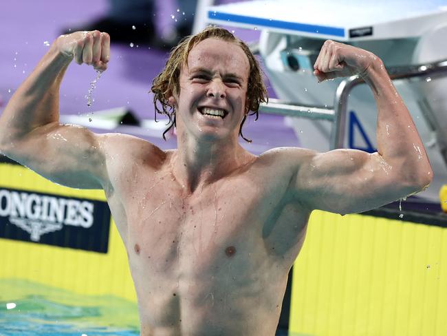 Sam Short celebrates winning the 1500m freestyle. Picture: Michael Klein