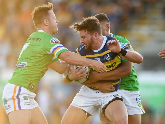 Clint Gutherson tackled by the Canberra defence. Picture: Gregg Porteous/NRL Photos