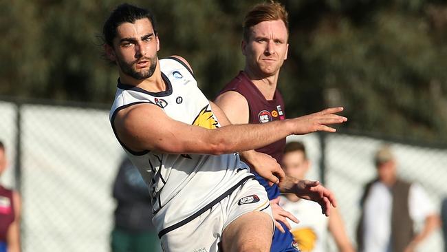 Xavier Dimasi bombs Whittlesea into attack. Picture: Hamish Blair