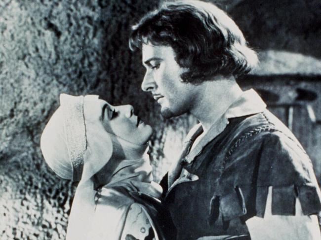 PIRATE: Actors Olivia de Havilland (L) and Errol Flynn in 1938 film 'The Adventures of Robin Hood'.