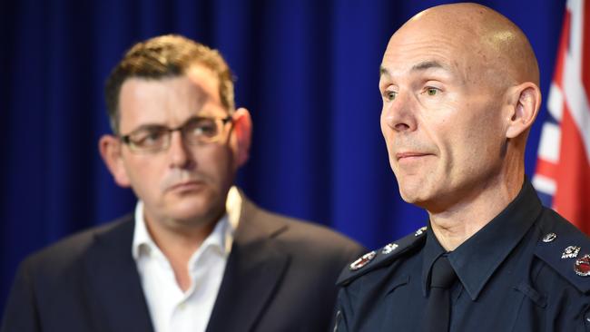 Deputy Police Commissioner Andrew Crisp, right, with Victorian Premier Dan Andrews. Picture: Lawrence Pinder