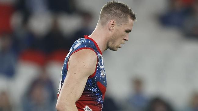 MELBOURNE, AUSTRALIA - MAY 21: Tom McDonald of the Demons moves gingerly during the round 10 AFL match between the North Melbourne Kangaroos and the Melbourne Demons at Marvel Stadium on May 21, 2022 in Melbourne, Australia. (Photo by Mike Owen/AFL Photos/via Getty Images)