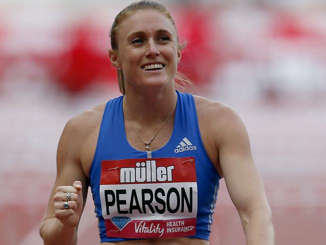 Australia's Sally Pearson celebrates winning silver in the Women's 100 metre Hurdles final  during the London Anniversary Games at London Stadium, London, Sunday July 9, 2017. (Paul Harding/PA via AP)