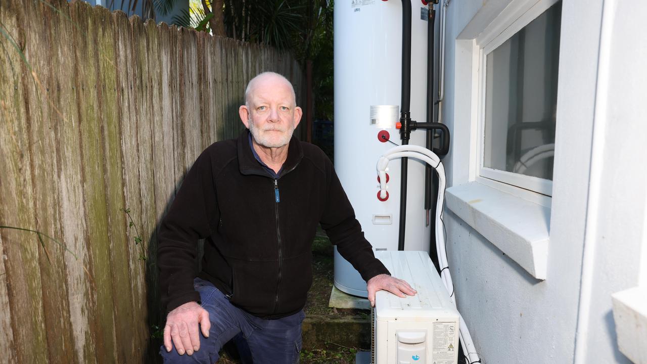 Perry Walker has major concerns about the wiring and noise of the system installed by Ecogenica at his partners’ home in Mona Vale. Picture: Tim Hunter.