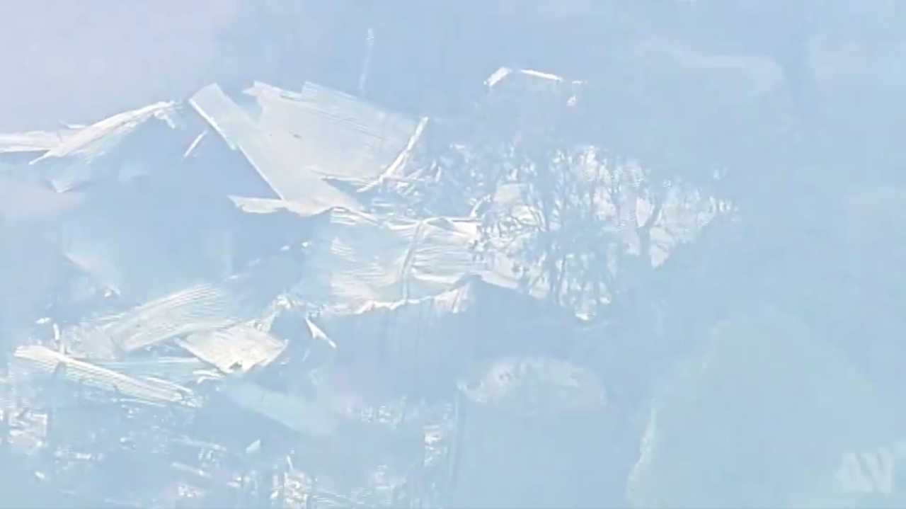 Helicopter vision shared via the ABC showed a burnt-out home near Crows Nest. 