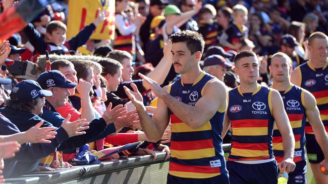 Crows get up close and personal with fans after a win. Photo: Tom Huntley.