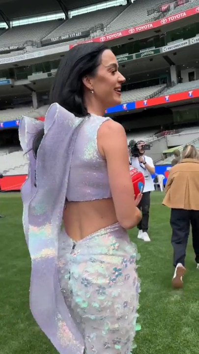 Katy Perry shows off her AFL skills