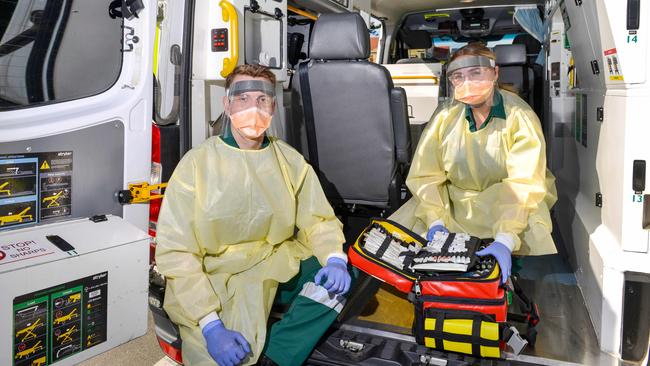 Paramedics Lachie Graham and Gabriella Basso with the mobile testing unit at Largs Bay. Picture: Brenton Edwards