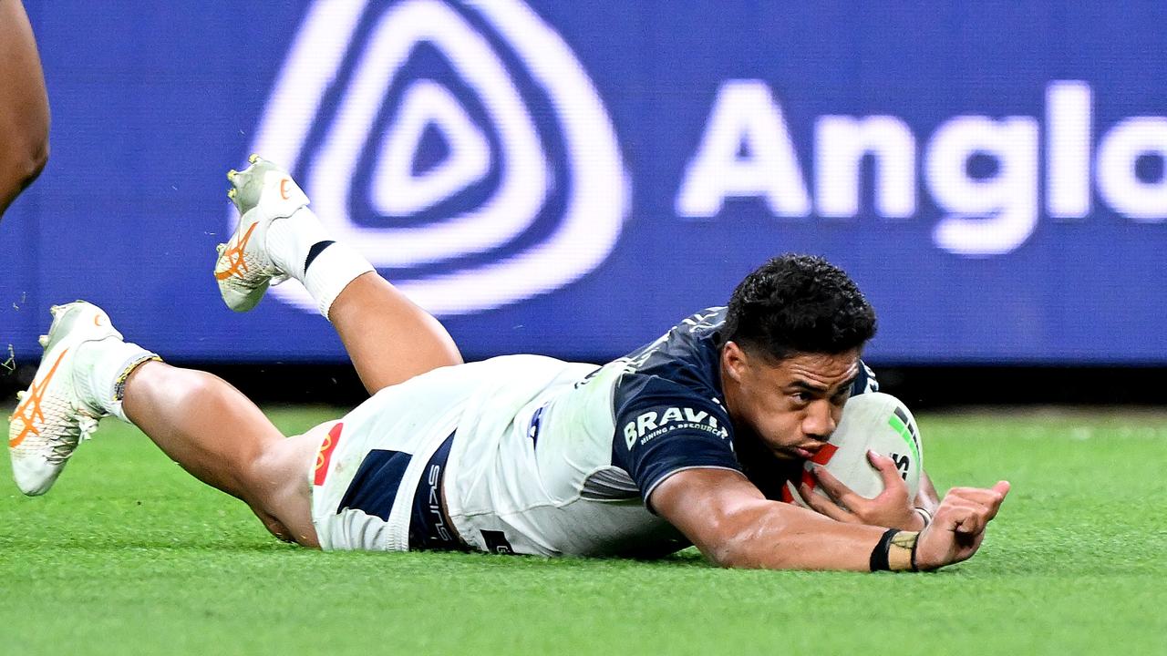 Murray Taulagi of the Cowboys scores a try during round 26, 2023. (Photo by Bradley Kanaris/Getty Images)