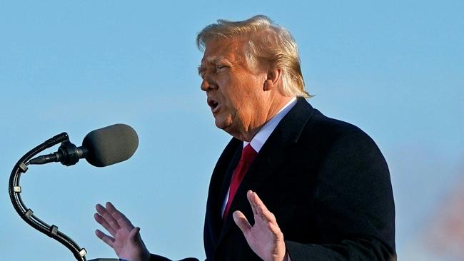 Outgoing US President Donald Trump addresses guests at Joint Base Andrews in Maryland. Picture: AF.)