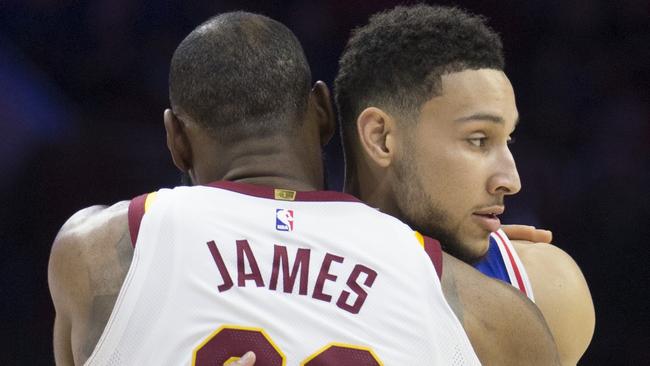 LeBron James and Ben Simmons embrace prior to their first NBA clash.