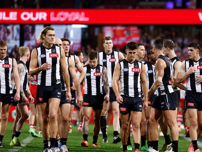 SYDNEY, AUSTRALIA - AUGUST 09: The Magpies look dejected after a loss during the 2024 AFL Round 22 match between the Sydney Swans and the Collingwood Magpies at The Sydney Cricket Ground on August 09, 2024 in Sydney, Australia. (Photo by Michael Willson/AFL Photos via Getty Images)