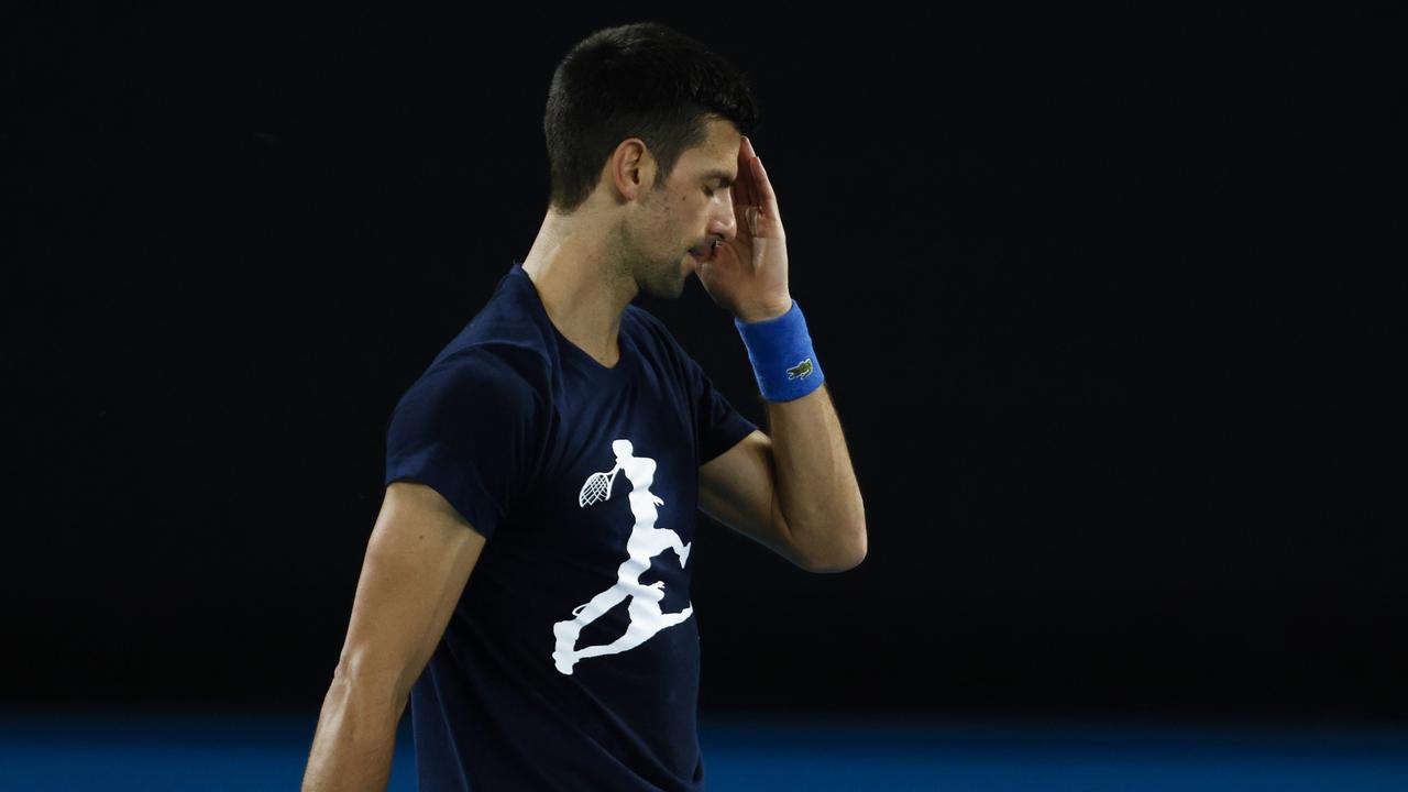 Novak Djokovic reacts during a practice session at Melbourne Park ahead of the 2022 Australian Open. Picture: Daniel Pockett/Getty Images