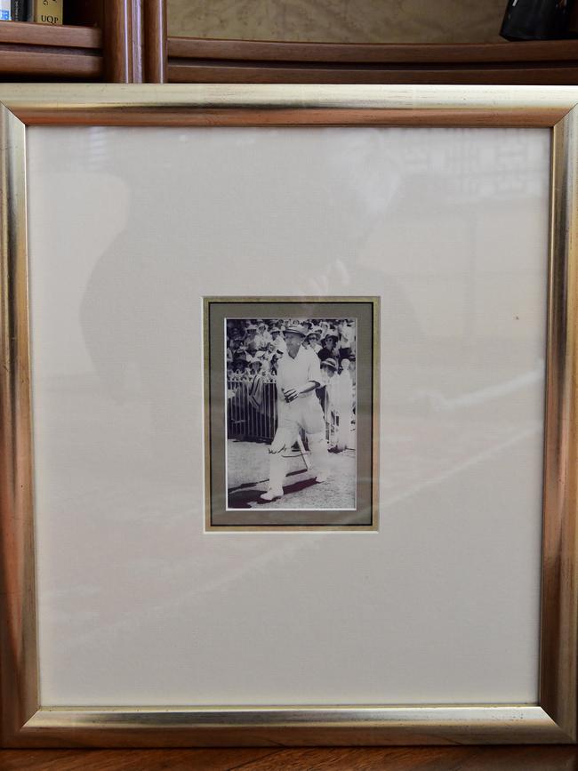 A signed framed photograph of Don Bradman belonging to former prime minister Bob Hawke is seen at his home in Northbridge, Sydney, Wednesday, August 21, 2019. A range of items belonging to Bob Hawke and Blanche D'Alpuget will go to auction on August 27. (Bianca De Marchi)