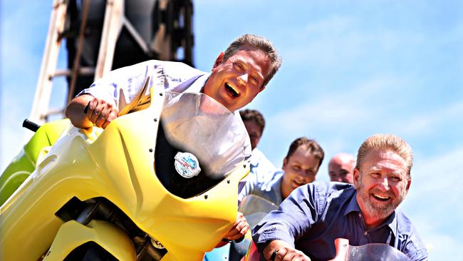 Then-LNP Leader Tim Nicholls – with fellow LNP MPs Michael Crandon, Michael Hart and Mark Boothman – rides the Motocoaster at Dreamworld during the 2017 election. Picture: Annette Dew