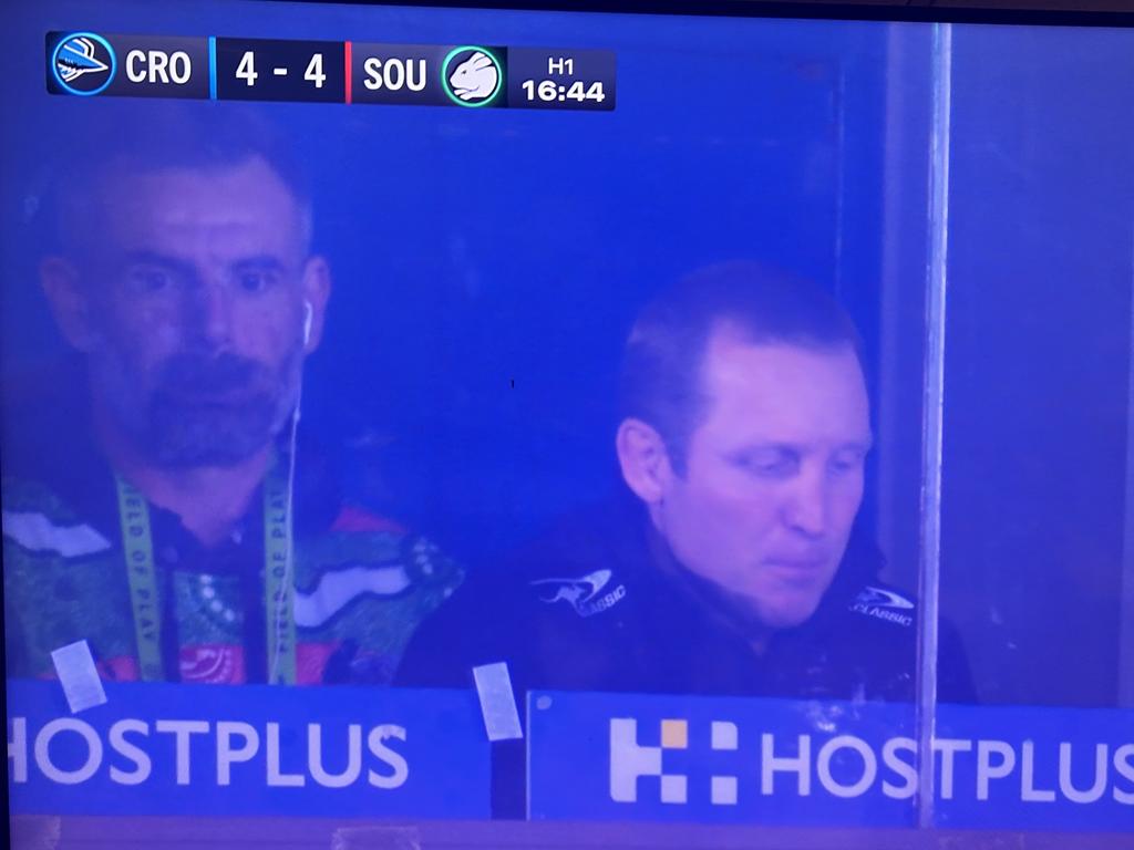 Former referee Gavin Badger in the South Sydney coaches box. Picture: Fox League