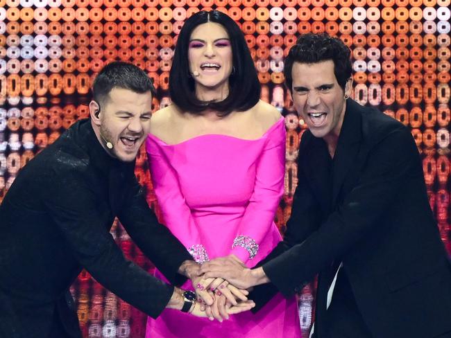 (from left) Italian television presenter Alessandro Cattelan, Italian singer Laura Pausini and Lebanese-born British singer-songwriter Mika present the first semi-final. Picture: AFP