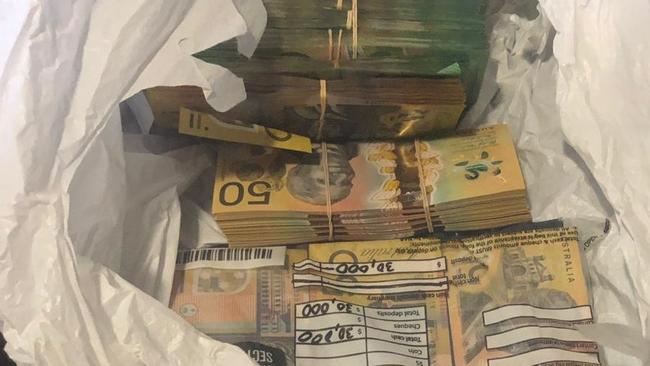 As part of their investigations the AFP seized approximately $100,000 they allege was proceeds of crime. Police supplied image