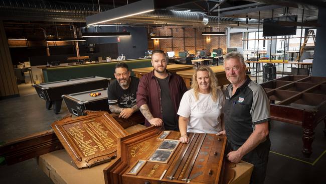 Bar manager Sam Thurgood, Head Chef Kirk Frawley, General manager Melinda Appleby and President Michael Grubb setting up at the Hobart Workers Club new premises. Picture: Chris Kidd