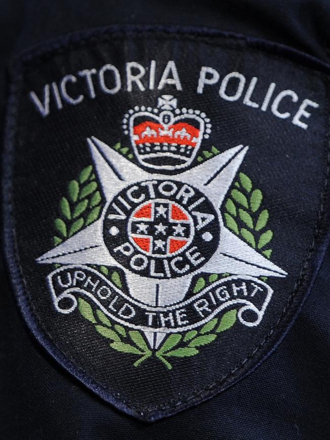 A police uniform was found among the millions in cash and drugs seized during the raids.