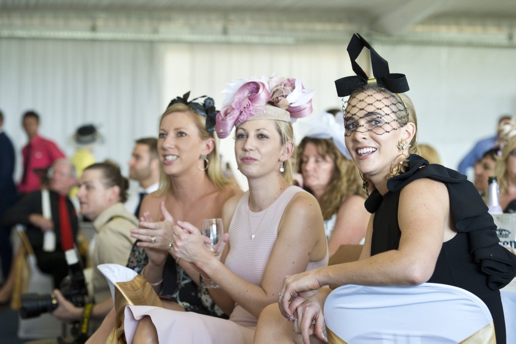 Watching on are (from left) Lisa Hohn, Jacqui Blackburn and Sian Benson at Melbourne Cup celebrations at Clifford Park, Tuesday, November 7, 2017. Picture: Kevin Farmer