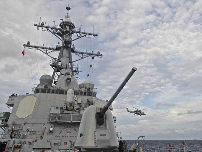 This US Navy photo obtained October 21, 2016 shows An MH-60R Sea Hawk, assigned to Helicopter Maritime Strike Squadron (HSM) 49,as it takes off from the flight deck aboard the guided-missile destroyer USS Decatur (DDG 73) on September 14, 2016 in the Sea of Japan.  A US destroyer sailed close to a string of islands claimed by China in the South China Sea on October 21, 2016, the Pentagon said, amid continued tensions in the contested waterway. The USS Decatur passed close to the Paracel Islands and "conducted this transit in a routine, lawful manner without ship escorts and without incident," Pentagon spokesman Commander Gary Ross said.  / AFP PHOTO / Navy Media Content Operations (N / MC3 Gerald Dudley REYNOLDS / RESTRICTED TO EDITORIAL USE - MANDATORY CREDIT "AFP PHOTO / US NAVY/Specialist 3rd Class Gerald Dudley Reynolds" - NO MARKETING NO ADVERTISING CAMPAIGNS - DISTRIBUTED AS A SERVICE TO CLIENTS