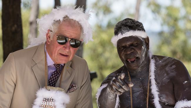 Prince Charles, the Prince of Wales, speaks with an indigenous elder during a Welcome to Country Ceremony at Mt Nhulun in Gove, Arnhem Land, Australia, Monday, April 9, 2018. The Prince of Wales and Duchess of Cornwall are on a seven-day tour of Australia, visiting Queensland and the Northern Territory. (AAP Image/Getty Images Pool, Brook Mitchell) NO ARCHIVING