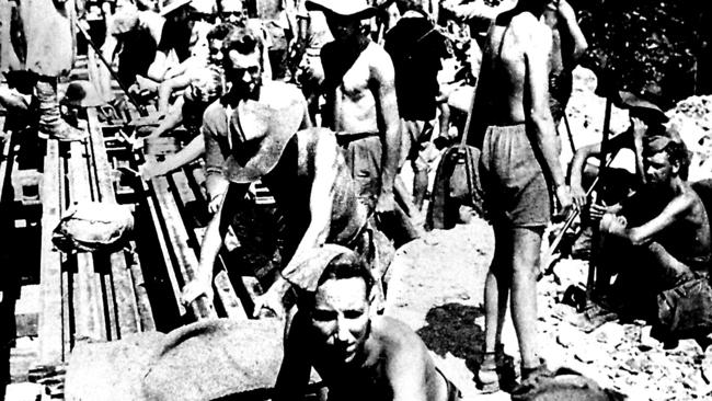 Australian and allied prisoners of war labouring at Hellfire pass.