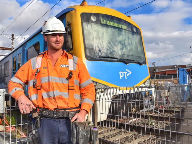 Nick works on the level crossing removal project. Picture: Tony Gough