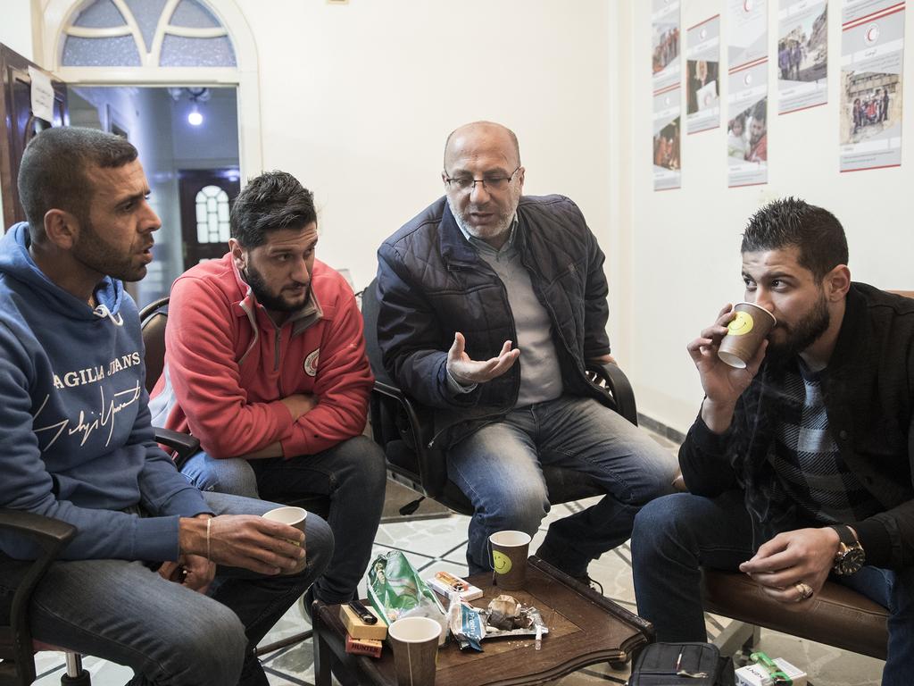 Syrian Arab Red Crescent field co-ordinator in Deir ez Zor Anas Ashwai, Media co-ordinator Mohamed Diab, director of the Syrian Arab Red Crescent in Deir ez Zor Mazen Hamde and clinics manager at SARC Damascus Anwar Aljundi. Picture: Ella Pellegrini