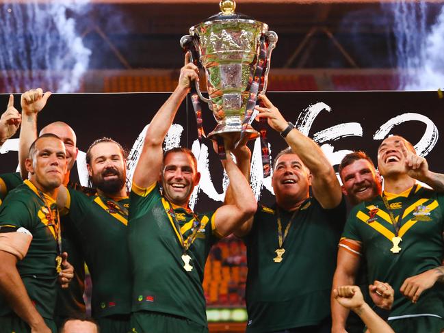 (FILES) This file photo taken on December 2, 2017 shows Australia celebrating their victory in the Rugby League World Cup men's final match between Australia and England in Brisbane. - Australia and New Zealand pulled out of the 2021 Rugby World Cup in England on July 22, 2021 citing "player welfare and safety" concerns during the Covid-19 pandemic. (Photo by Patrick HAMILTON / AFP) / --IMAGE RESTRICTED TO EDITORIAL USE - STRICTLY NO COMMERCIAL USE--