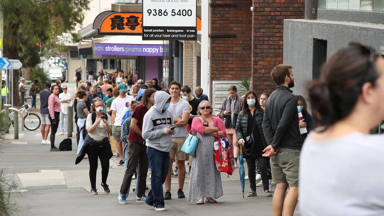 Hundreds of unemployed lined up at Bondi Junction Centrelink from 7am. Picture: David Swift.