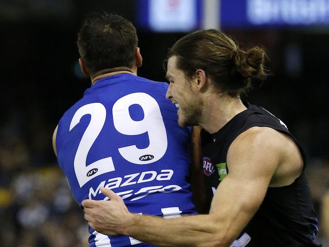AFL: Round 9 North Melbourne V Carlton at Etihad Stadium, 21st of May, Melbourne Australia. North Melbourne's Brent Harvey gets stuck into Carlton's Bryce Gibbs who retaliates in the first quarter. Picture : George Salpigtidis