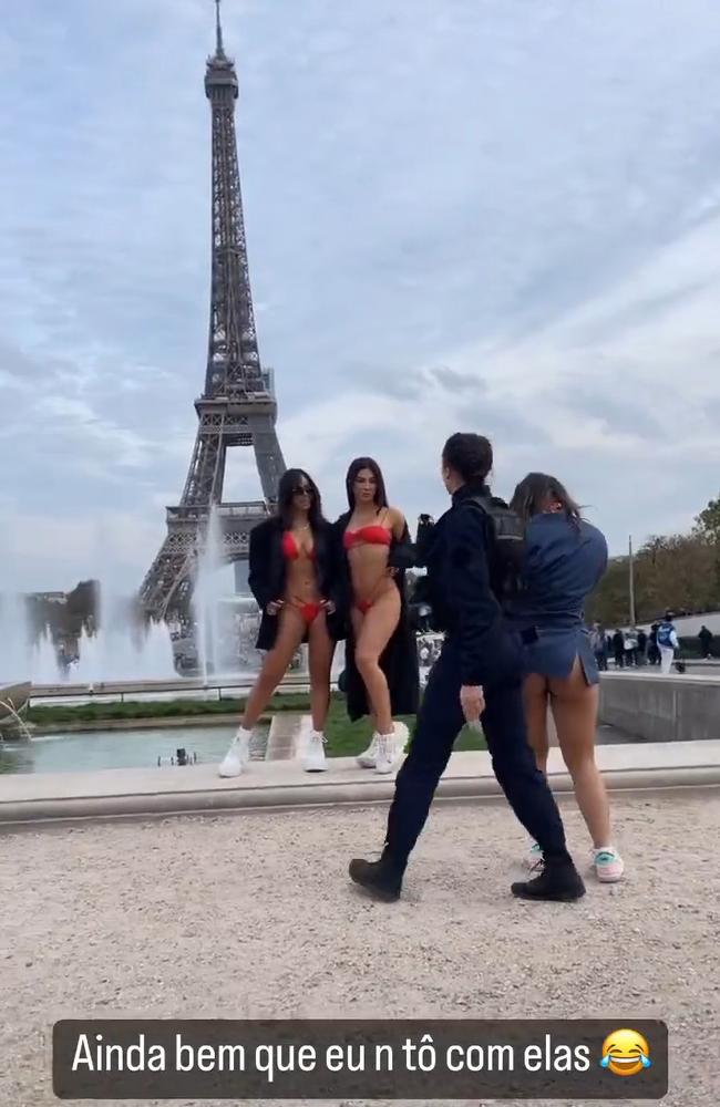 Influencers Gabriela Versiani, Vanessa Lopes and Gabily were approached by the police while taking bikini photos in front of the Eiffel Tower. Picture: CEN