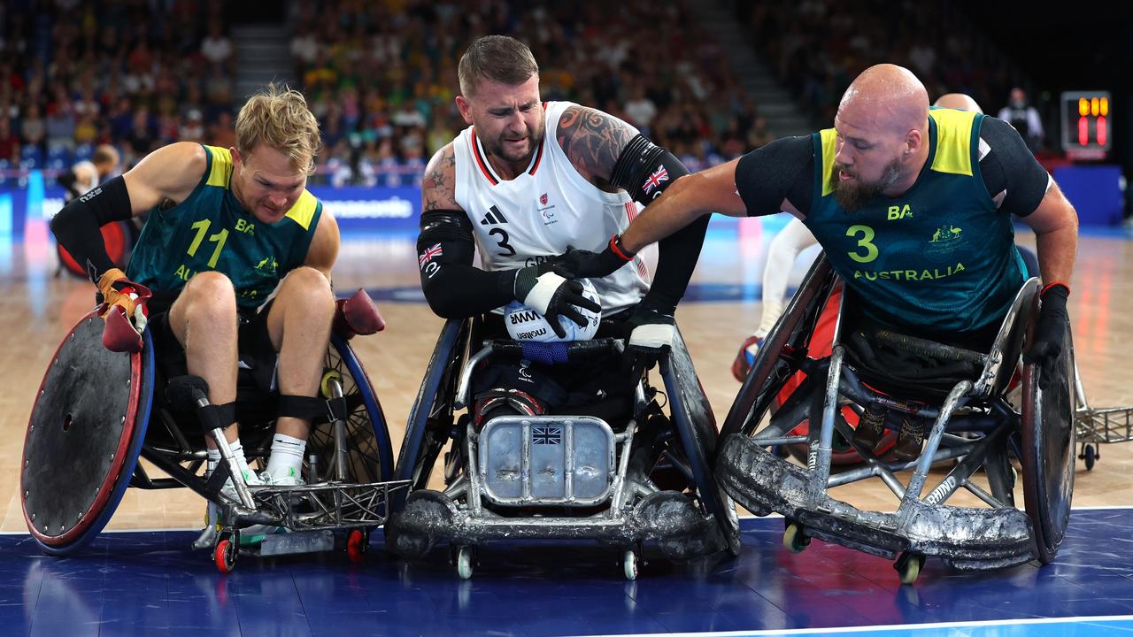 Stuart Robinson of Team Great Britain is tackled by Ryley Batt of Team Australia – the gripping match came down to the wire. Picture: Alex Davidson/Getty Images