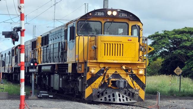 Paramedics transported three patients to hospital after they reportedly leapt from a moving train. Photo: Max Fleet