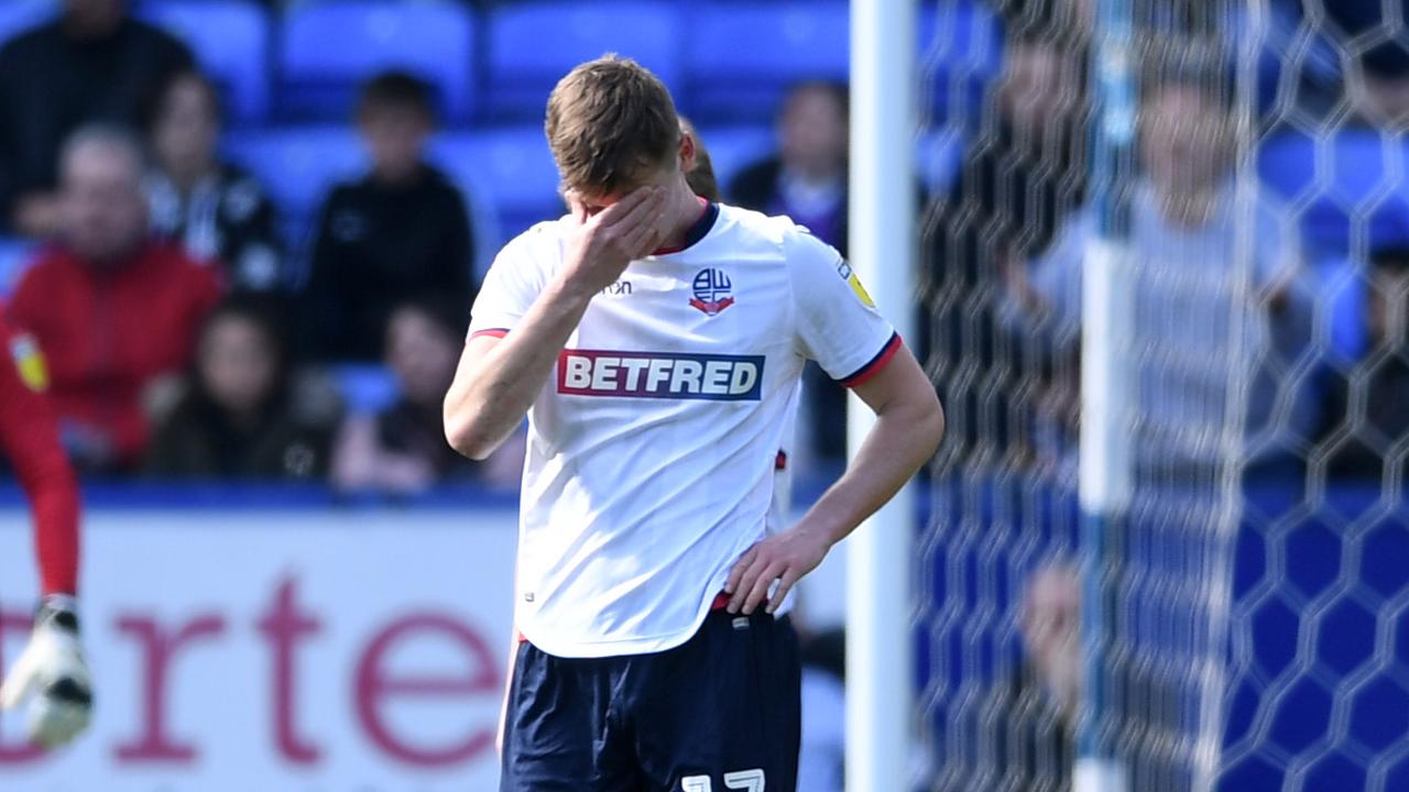 Callum Connolly of Bolton reacts