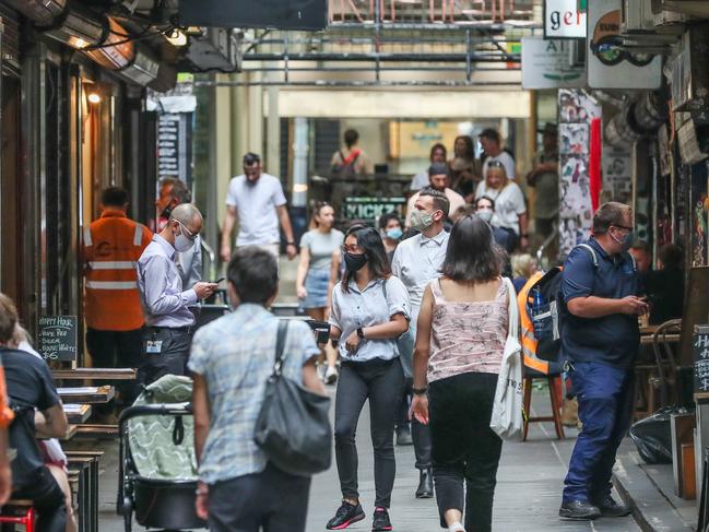 Masks are back in Melbourne … but there’ll be no scenes like this in Melbourne’s CBD for at least the next seven days. Picture: Getty Images