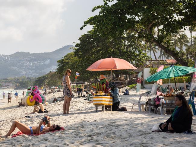 KOH SAMUI, THAILAND - MARCH 23: Tourists sunbathe on Chawang Beach, a 7km strip of sand on Samui's eastern coast, on March 23, 2024 in Koh Samui, Thailand. The upcoming season of "The White Lotus" is anticipated to have a massive impact on tourism in Thailand, with travel forecasters predicting a surge in visitors to destinations like Koh Samui, Phuket, and Bangkok. The allure of experiencing the real-life locations featured in the series is expected to fuel a travel trend, drawing attention to Thailand as a top-tier bucket list destination for global travellers. (Photo by Lauren DeCicca/Getty Images)