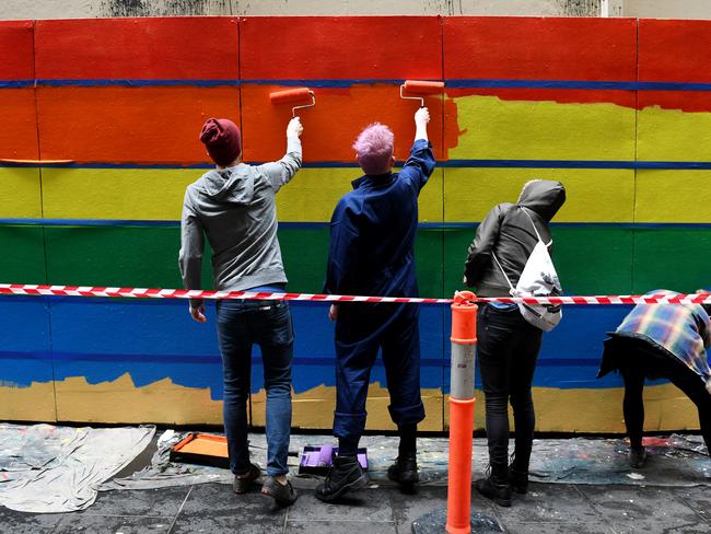 The Apparition team paint a pro-gay marriage mural at Knox Lane in Melbourne. Picture: AAP Image/Tracey Nearmy