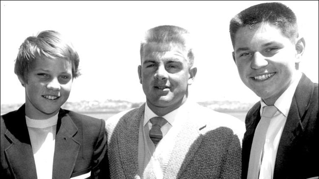 Number 18: Don Talbot flanked by champion siblings Ilsa and John Konrads.